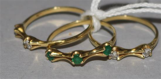 An 18ct gold, emerald and diamond triple band ring, size O.